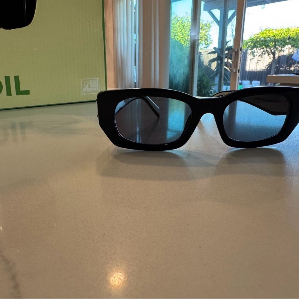 Prada Elegant Black Sunglasses